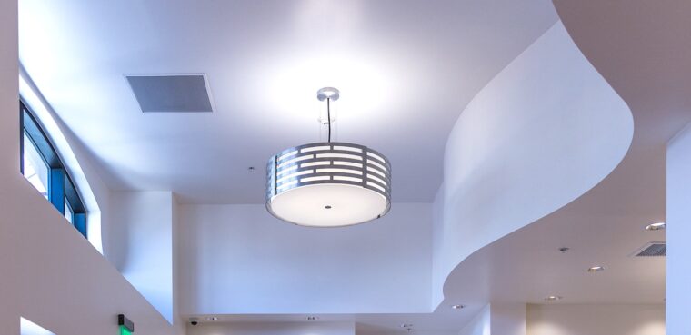 curved ceilings and modern light fixture at nems clement
