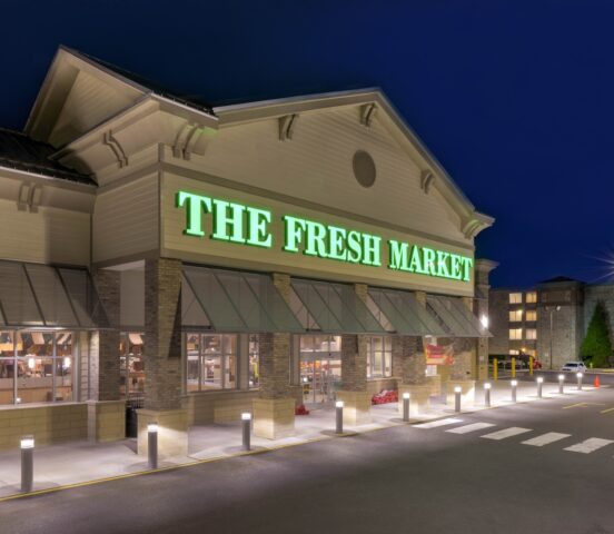 Exterior night view of the Fresh Market