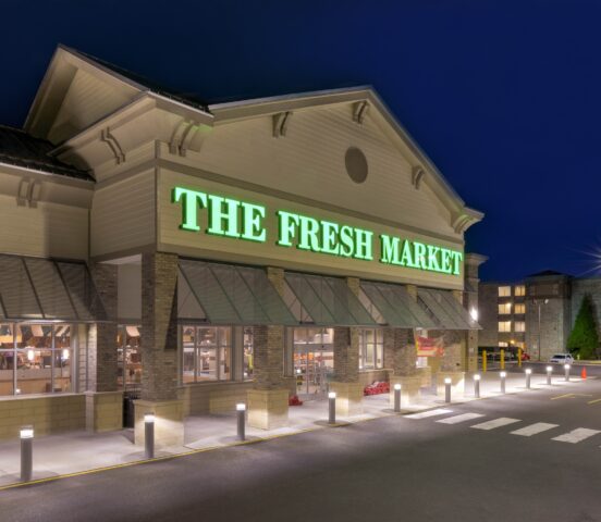 Exterior night view of the Fresh Market