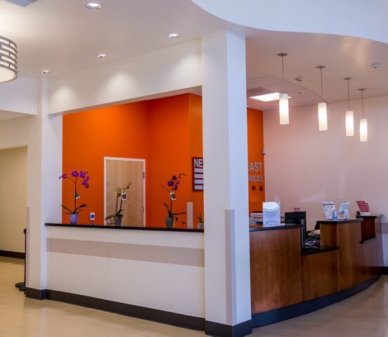 welcome desk and waiting area at nems clement