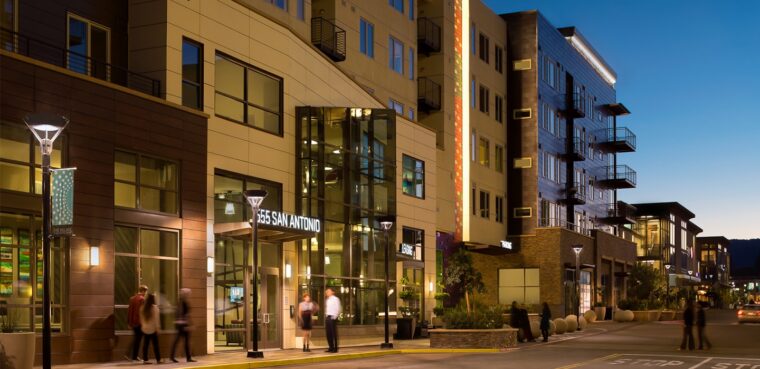 the village san antonio center apartments at dusk