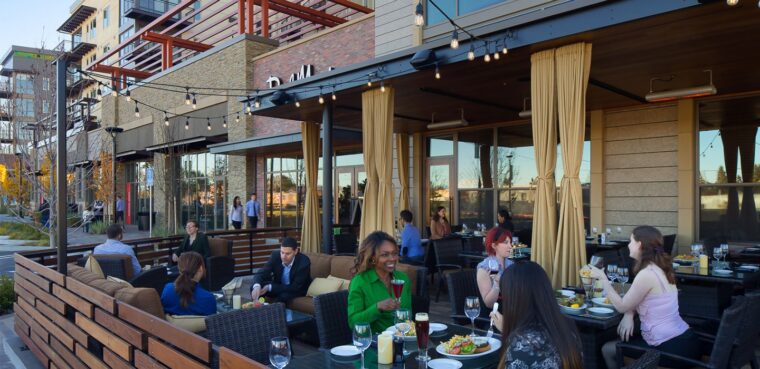outdoor seating at the village san antonio center restaurant