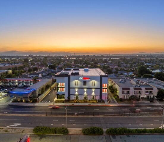 The sun setting behind Go Store It in Pico Rivera