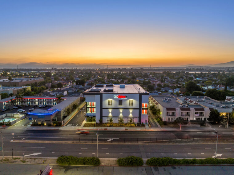 The sun setting behind Go Store It in Pico Rivera