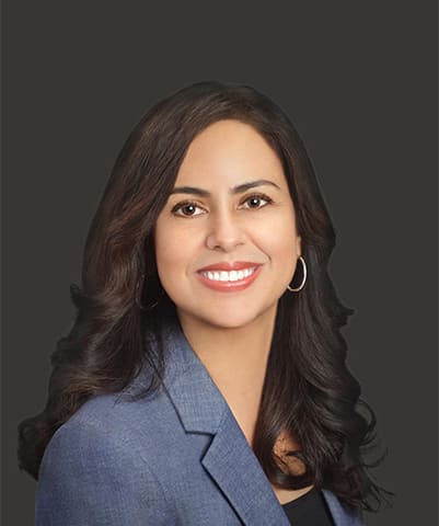 A headshot of Olga Ruiz