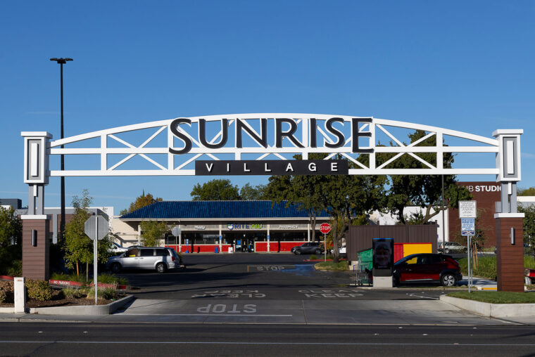 A Sunrise Village entrance sign