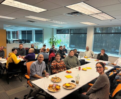mcg staff eating a meal together