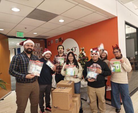 mcg employees donating goods to charity