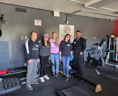 mcg employees in a fitness room