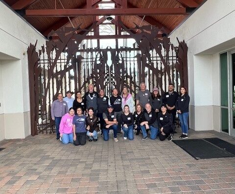 mcg employees on a community outing