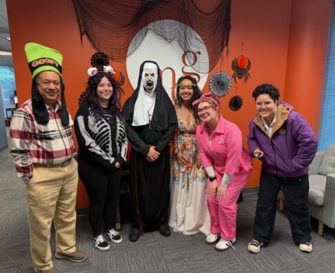 six people in halloween costumers