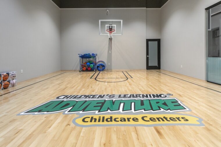 An indoor basketball court at Children’s Learning Adventure