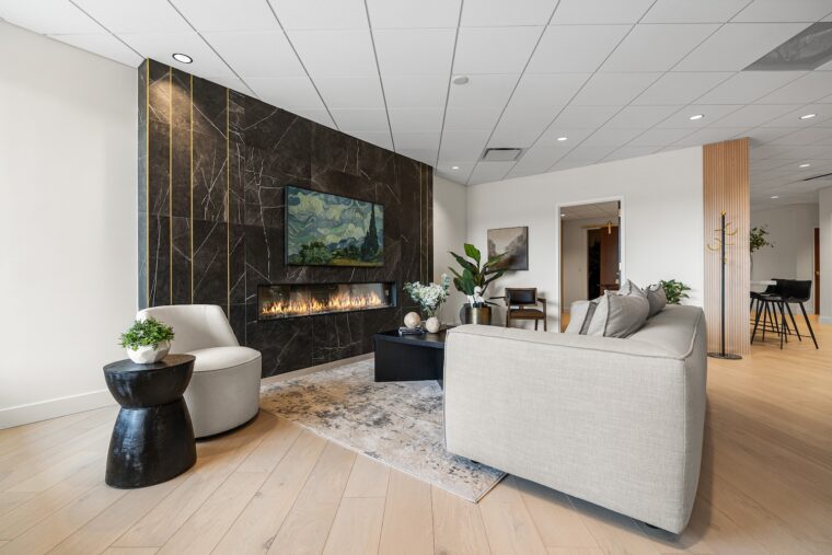 A fireplace at The Orchard Spinal Clinic